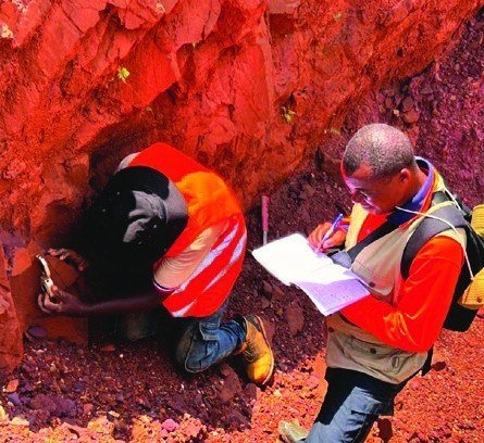 Geologists sampling in the field